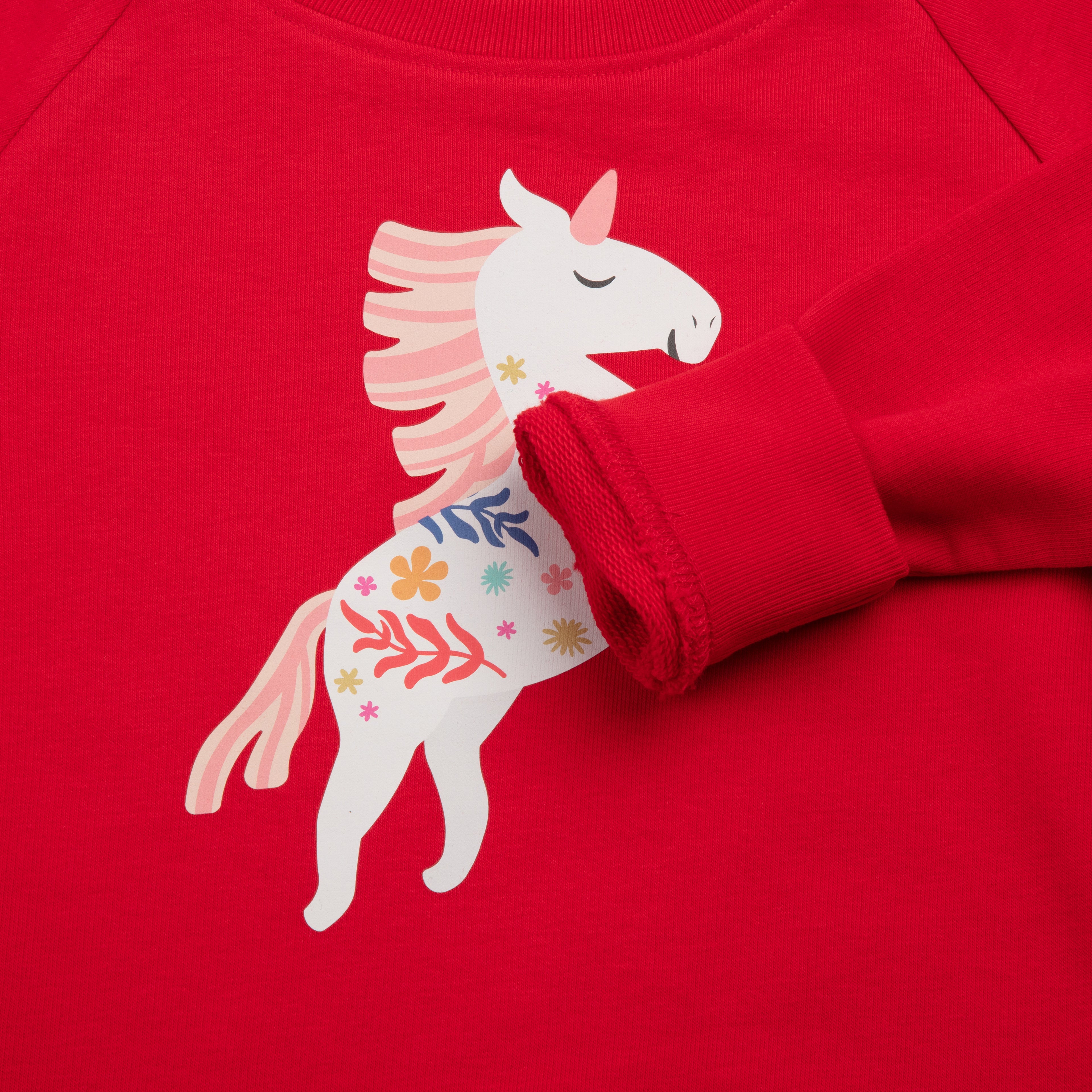 Who said nachhaltiger Sweater in Rot mit Einhorn-Print