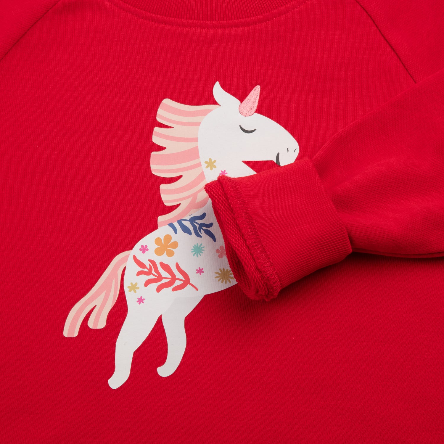 Who said nachhaltiger Sweater in Rot mit Einhorn